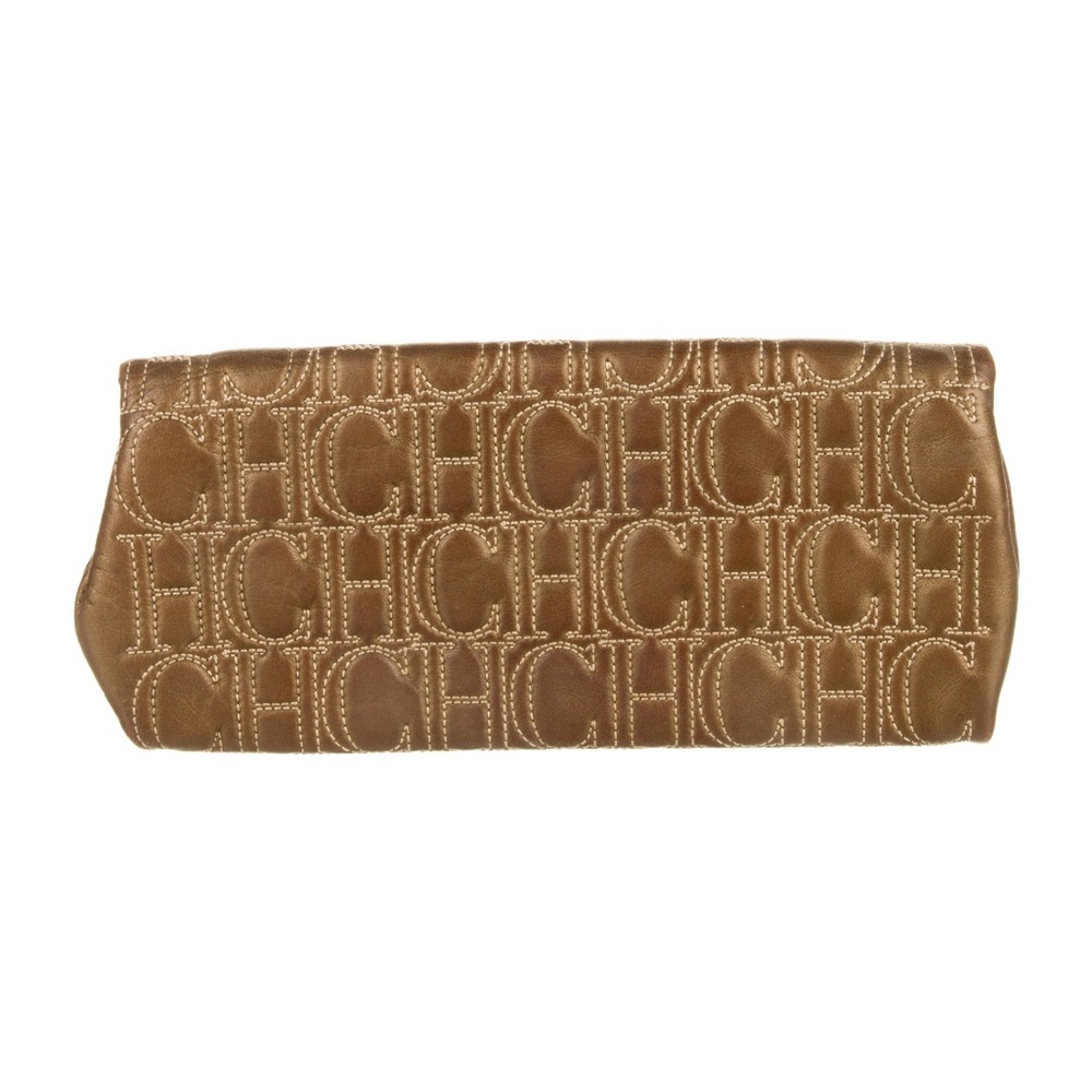 Carolina Herrera clutch. Gold. 100% original. 100% leather. Good condition